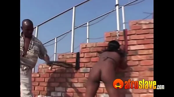 African sub slave t. outdoors